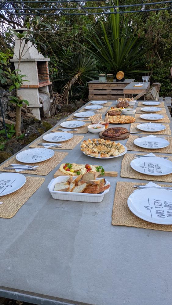 Family dinner with many dishes on the table